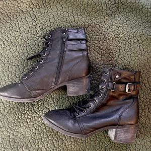 Black zip up boots.  Combat style with short heel. Women’s Size 8.5